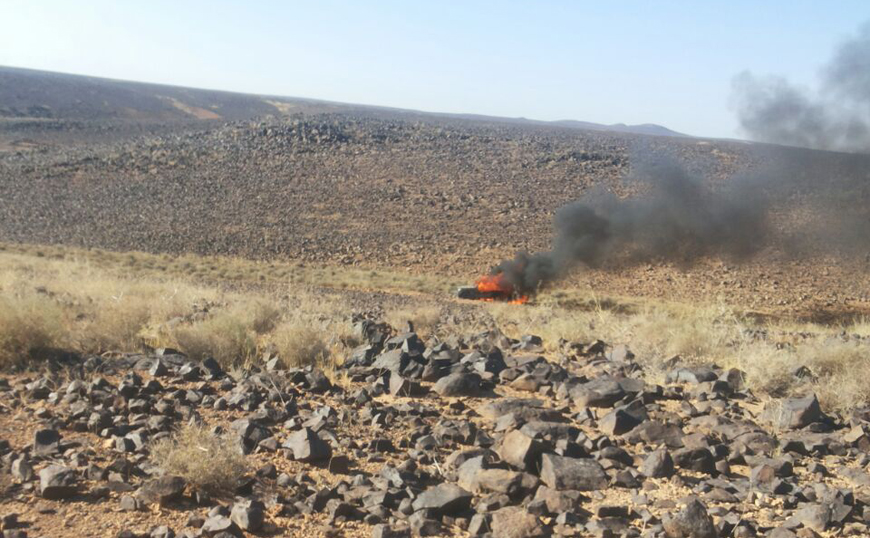 A vehicle is seen on fire after the army hit it during an attempt to infiltrate the border with Syria by smugglers  (Petra photo)